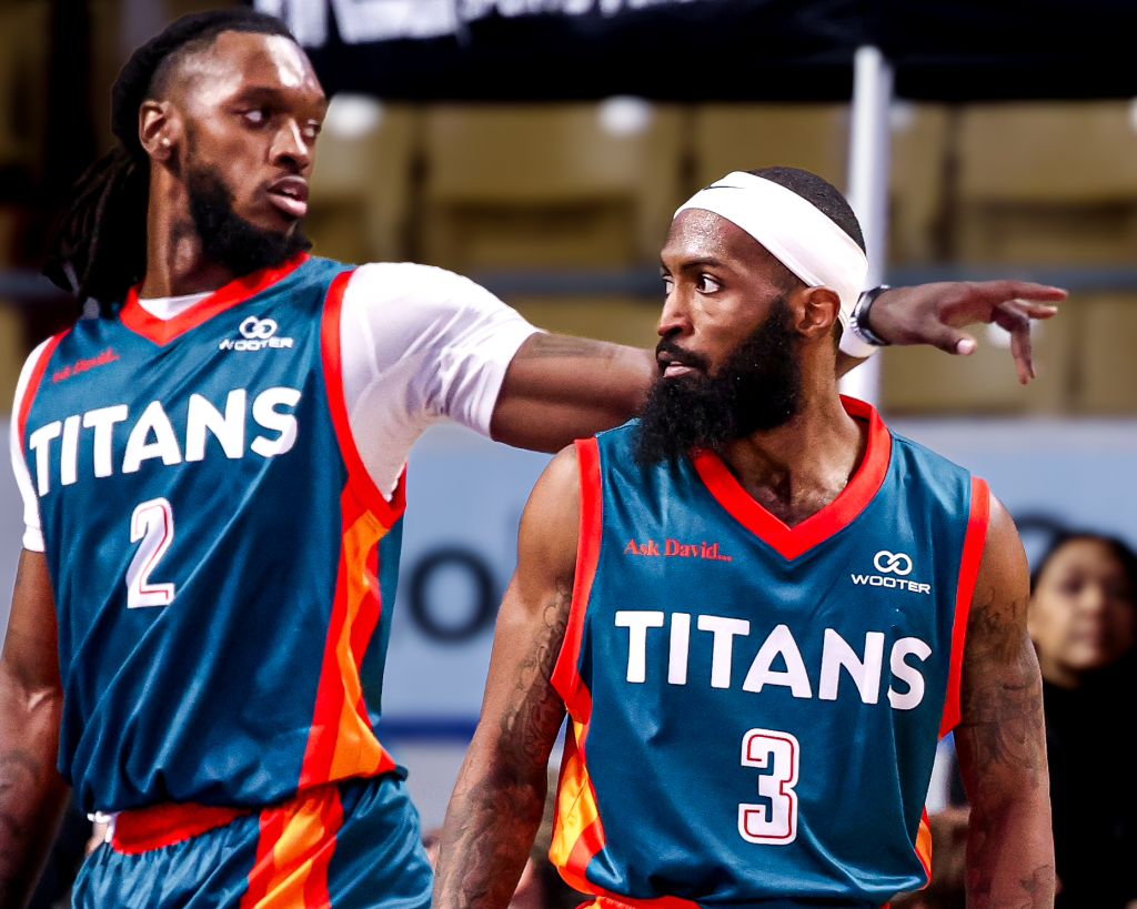 KW Titans, CJ Felder and James Towns regroup after a play for the ball
