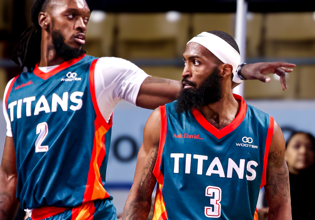 KW Titans, CJ Felder and James Towns regroup after a play for the ball