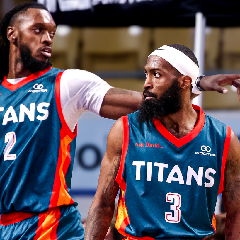 KW Titans, CJ Felder and James Towns regroup after a play for the ball